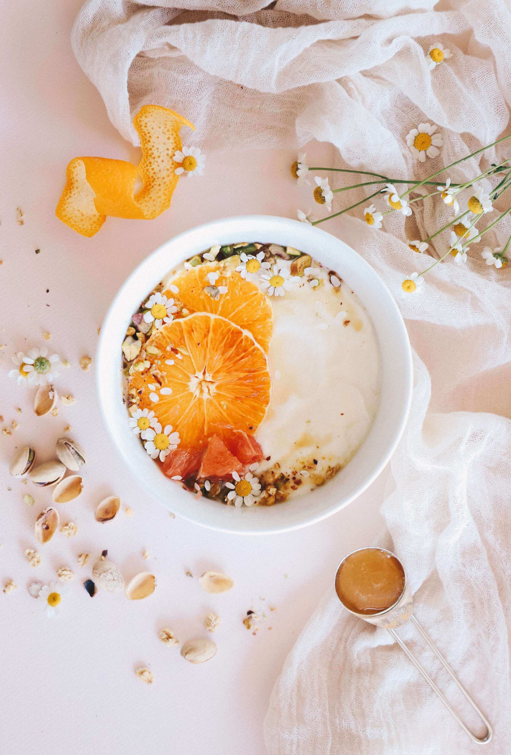 Plant-based yogurt with fruits and flowers