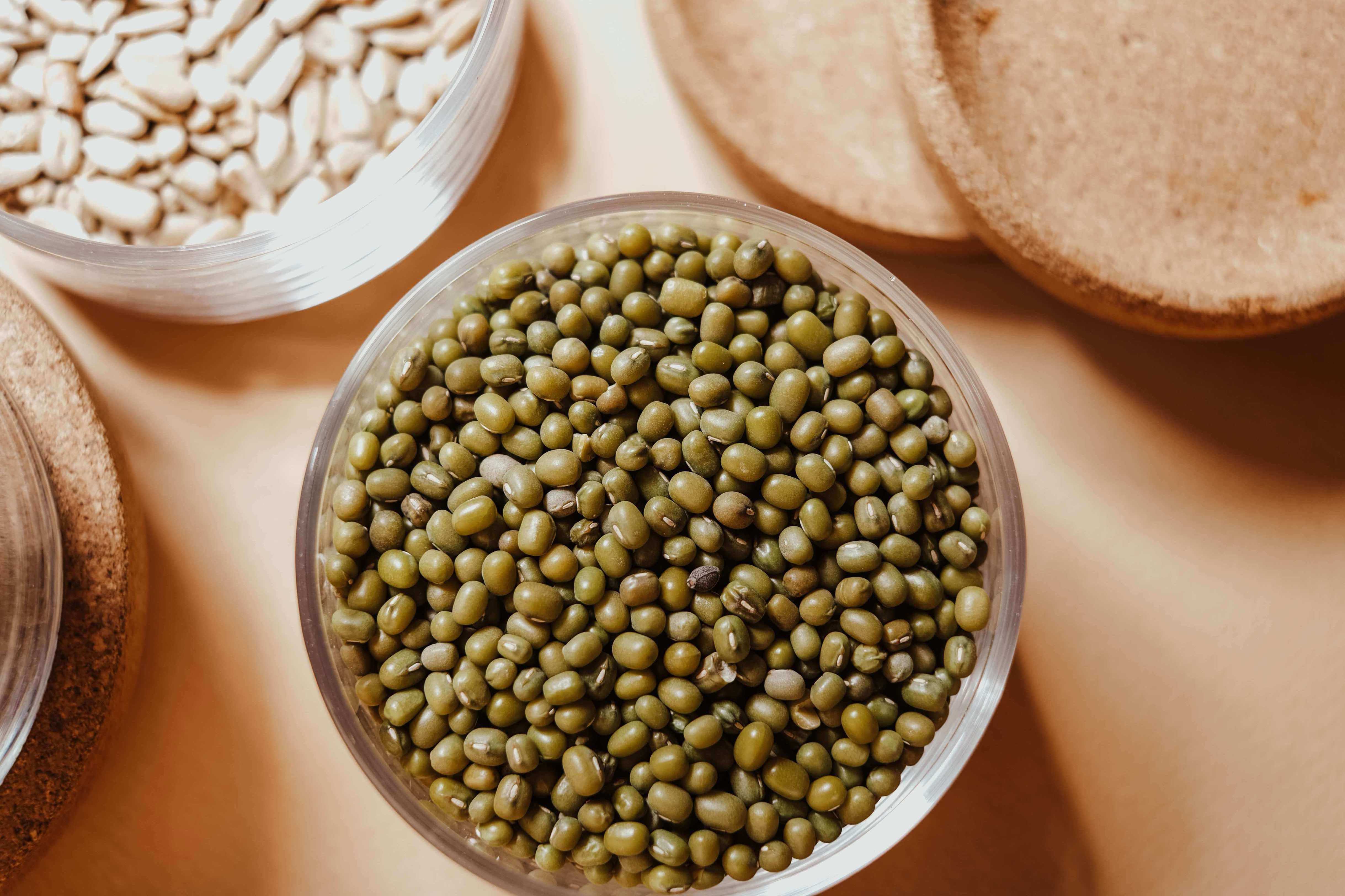 Bowls with different legumes, mainly Mung Beans